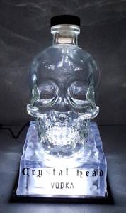 lot 43 image: Crystal Head Vodka (1) Skull Bottle (Empty) (1) Light Up Pedestal