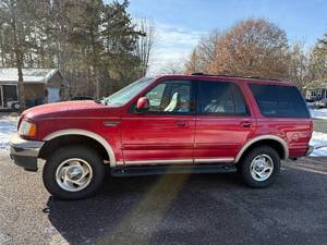 lot 6 image: Red 1999 Ford Expedition SUV - Eddie Bauer Edition