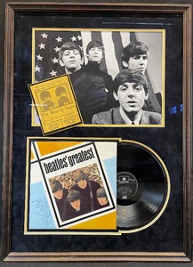 lot 424 image: The Beatles Greatest Framed Vinyl Record Display