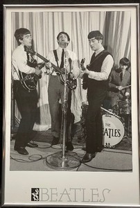lot 432 image: The Beatles Framed Black-And-White Performance Poster