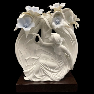 lot 336 image: Lladro Porcelain Nymph with Flower Figurine Auction Estimate $1,500 - $2,500