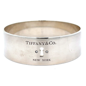 lot 246 image: Tiffany & Co. Two-Stone Diamond Keyhole Bangle Bracelet in 925 Sterling Silver