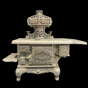 lot 384 image: Antique Salesmans Sample Miniature Cast Iron Eagle Cook Stove Auction Estimate $1000 - $1500
