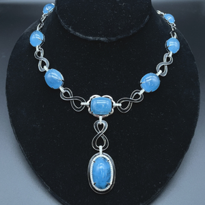 lot 281 image: Designer Oscar Friedman 143.34 Carat Aquamarine & Natural Diamond Infinity Symbol Y-Necklace in 14k White Gold w Report Appraisal $55,436