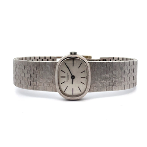 lot 210 image: Cindy Cashs Personally Owned Patek Philippe White Golden Ellipse Collection Vintage Timepiece in 18k White Gold $10,000 Estimate