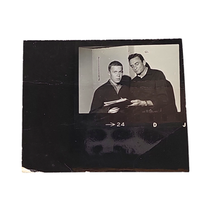 lot 74 image: Johnny Cash Original Contact Photo Sheet Segment  Signing for a Fan