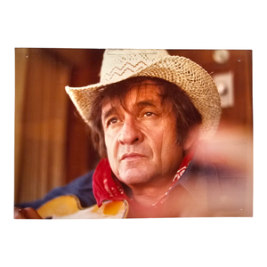 lot 84 image: Johnny Cash Original Color Portrait Photograph in Cowboy Hat $4,000 - $6,500 Estimate 