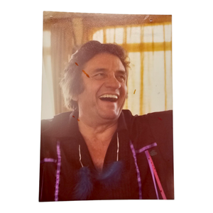lot 85 image: Johnny Cash Original Color Portrait Photograph Laughing $3,000 - $5,000 Estimate 