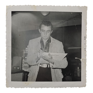 lot 76 image: Johnny Cash Original 1957 Photo  Signing Album Autographs