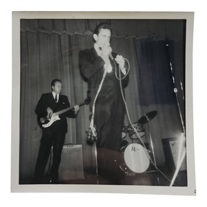lot 92 image: Johnny Cash Original GAF Instant Photo Performing On Stage $3,000 - $6,000 Estimate 