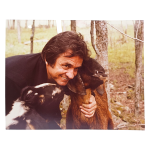 lot 94 image: Johnny Cash with Goats  Country Music Magazine Photo Shoot - Johnnys Original Print $3,000 - $5,000 Estimate 