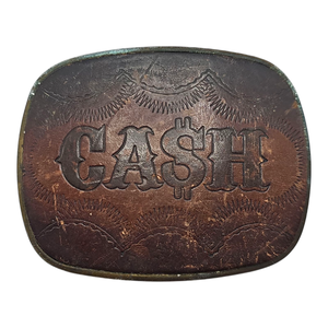lot 104 image: Johnny Cash Owned  American Eagle CASH Leather and Brass Belt Buckle $3,000 - $5,000 Estimate 