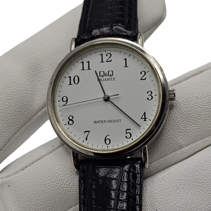 lot 110 image: Johnny Cash Owned  Q&Q Quartz Watch