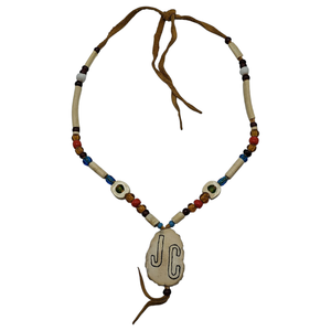 lot 113 image: Johnny Cash Owned  Engraved JC Native American Beaded Necklace Made for Johnny Cash $2,500 - $4,500 Estimate 