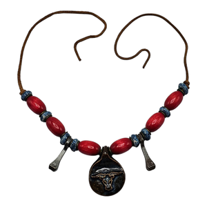 lot 115 image: Johnny Cash Owned  Handcrafted Beaded Native American Necklace with Bull Pendant Made for Johnny Cash