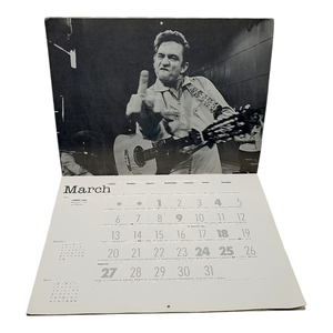 lot 145 image: Johnny Cash Owned  Personal Copy  Flip the Bird A One-Finger Salute to 1994 Calendar