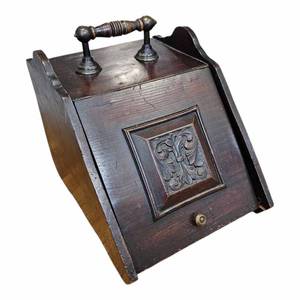 lot 10 image: Johnny Cash Owned  Antique Coal Hod from His Home $750 -$1,500 Estimate