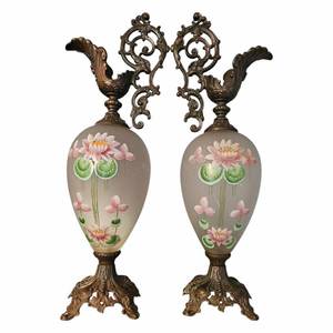 lot 9 image: Johnny Cash Owned  Pair of Antique Hand-Painted Glass and Brass Ewers $900 - $1,800 Estimate