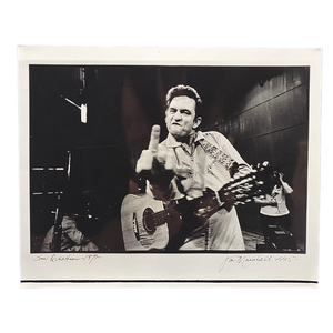 lot 173 image: Iconic Johnny Cash San Quentin Middle Finger Photo  Jim Marshall Signed Print