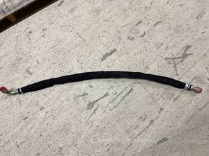 lot 60 image: 4.5ft, 34 Hydraulic Hose with Armor Guard and Fittings