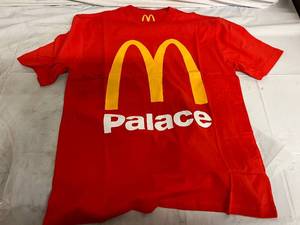 lot 16 image: 60 Red Mcdonalds Shirts - Large