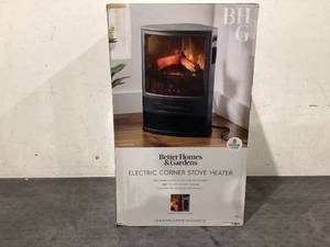 lot 635 image: Better Homes & Gardens New Electric Corner Stove Heater