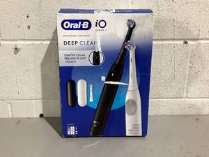 lot 592 image: Oral-B iO Series 2 Electric Toothbrush, Pure White & Night Black, 2 Ct, 3 Heads