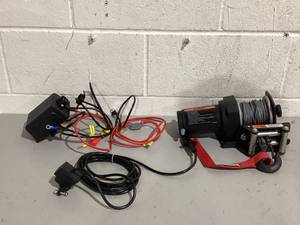 lot 604 image: Hyper Tough 2500 lb 12V DC Electric ATV Winch with 50ft. Steel Rope and Mounting Bracket