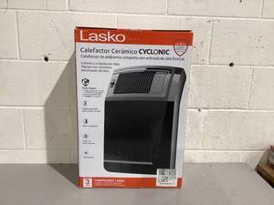 lot 227 image: Lasko 1500W Cyclonic Ceramic Console Electric Space Heater with Timer, CC24925