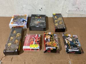 lot 40 image: LOT OF 7 Action Figure Collectibles