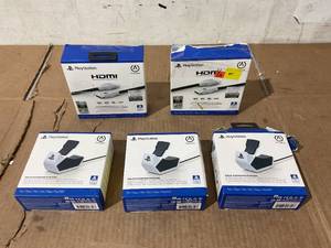 lot 290 image: Lot of 5 Playstation HDMI Cords and Solo Charging Stations