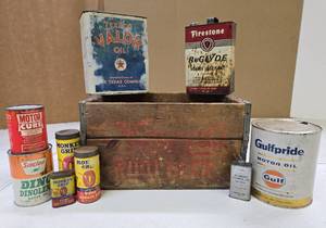 lot 243 image: Group of Advertising Oil Cans & Howells Root Beer Crate