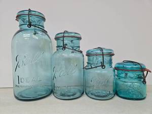 lot 319 image: Graduating Size Vintage Blue Glass Ball Mason Jars