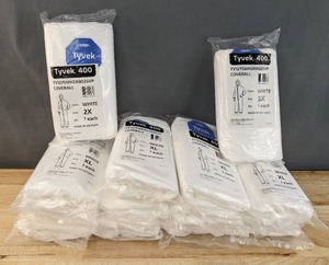 lot 137 image: 13 Dupont Tyvek 400 Coveralls White XL2X3X K
