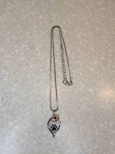 lot 402 image: New Dog Paw Pendant Necklace Silvery P