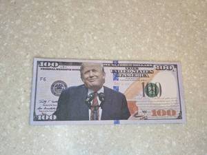 lot 405 image: New Trump Themed $100 Dollar Bill 20 Total P