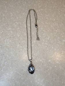 lot 418 image: New Moon Stone Pendant Necklace With Paw Print Silvery P