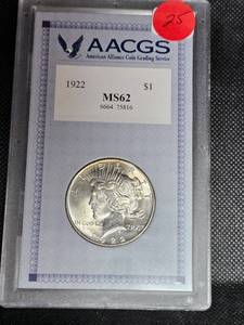 lot 25 image: 1922 Peace Dollar, MS62. Beautiful Toning