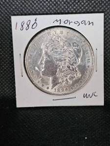 lot 115 image: 1886 Morgan UNC