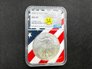 lot 34 image: 2002 1 Oz. Silver American Eagle NGC MS69