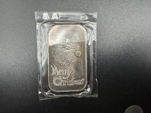 lot 73 image: Silvertowne1 Oz. .999 Silver Bar Christmas 1987