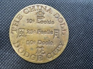 lot 94 image: China Doll Dodge City Brothel Token
