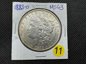 lot 11 image: 1883-O Morgan Silver Dollar MS63