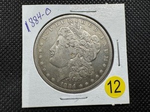lot 12 image: 1884-O Morgan Silver Dollar