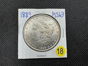 lot 18 image: 1889 Morgan Silver Dollar MS63