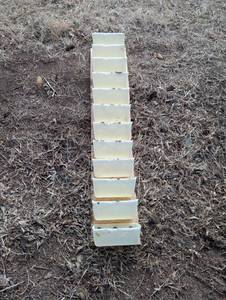 lot 48 image: 12 - 8 Bons on strip of conveyor belt Seed - Planter - More