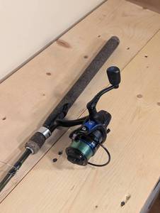 lot 57 image: Scheels Walleye Series 7 Med-Light Rod with Six Gill Karve 2000 Reel