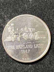 1 TROY OZ .999 FINE SILVER HIGHLAND LIGHT ROUND