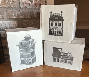 lot 84 image: Department 56 Dickens Village Series The Flat of Ebenezer Scrooge, Fezziwigs Warehouse and The Cottage of Bob Cratchit and Tiny Tim