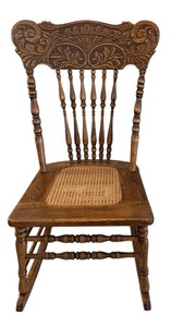 lot 52 image: Vintage Pressed Back Wooden Rocking Chair with Ratan Seat